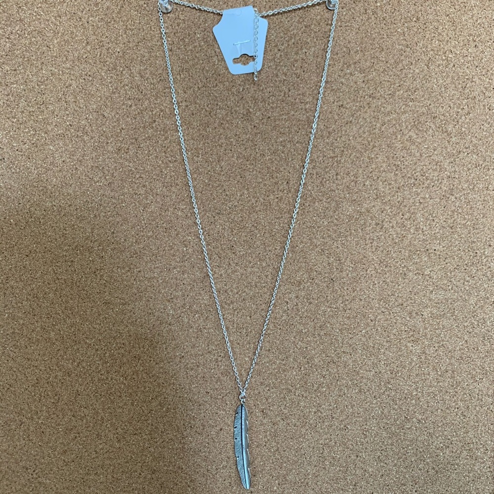 Brand new silver feather necklace